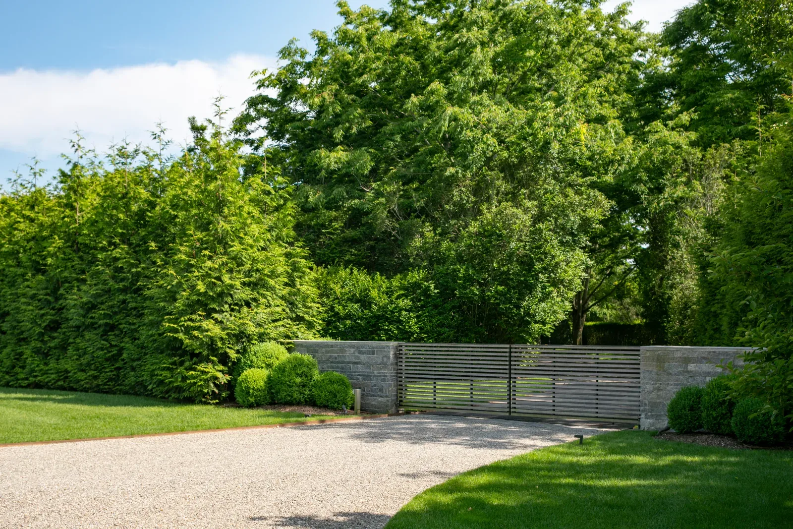 Lawn and landscape maintenance by Peconic Lawn & Tree Care